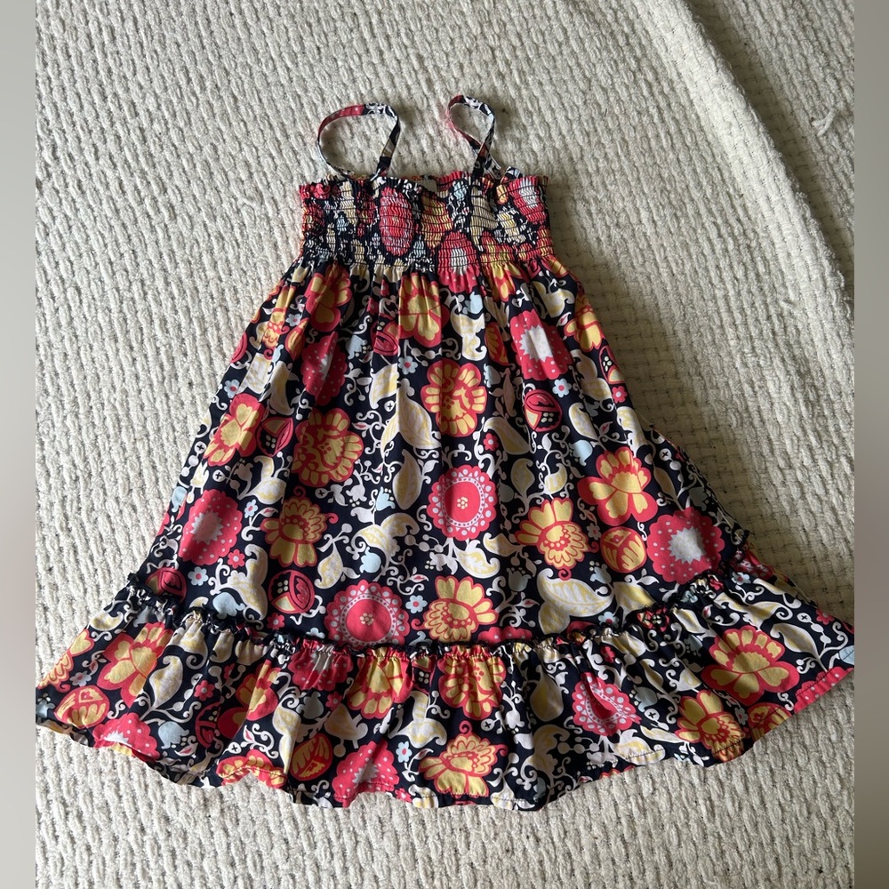 Hanna Andersson smocked bodice dress w/bottom ruffle. Size 4 Deep vibrant colors